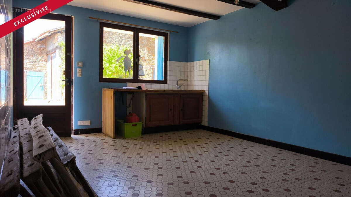Maison 107m² à romagne - photo 5