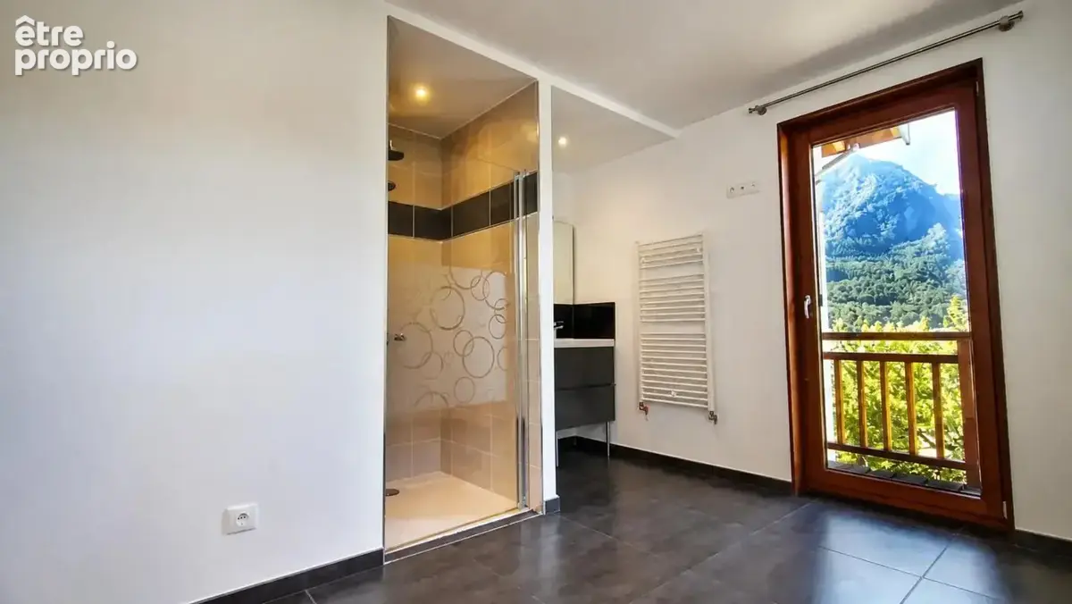 Maison de 4 pièces de 91 m² à Saint-Julien-Mont-Denis - photo 9