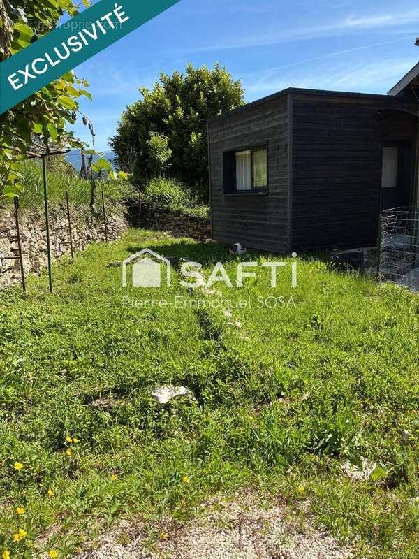 Maison 90 m² à Belmont-Luthezieu  - photo 3
