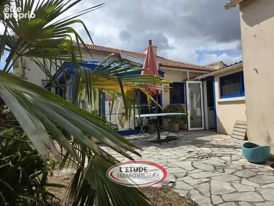 Photo 1 - Maison à BOUGUENAIS