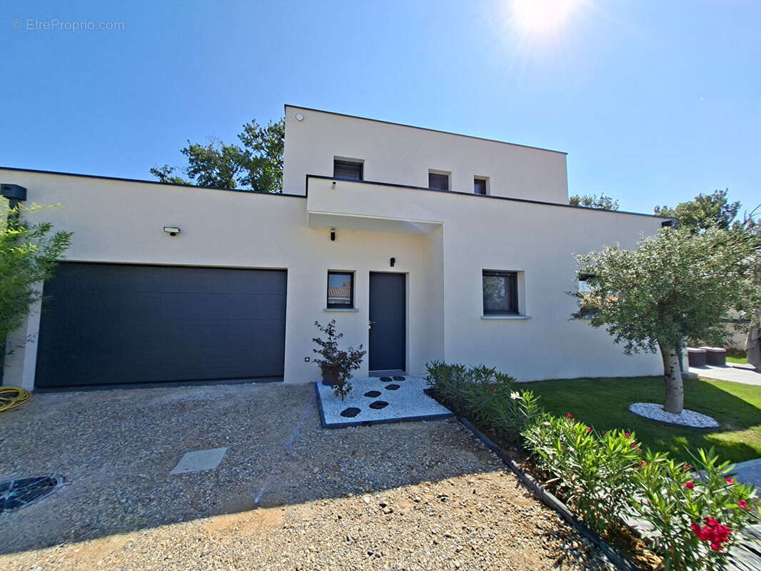 MAISON CONTEMPORAINE RT2020 5 pièce(s) 136 m2 ur 580m² terrain ROMANS SUR ISERE 26100 - photo 16