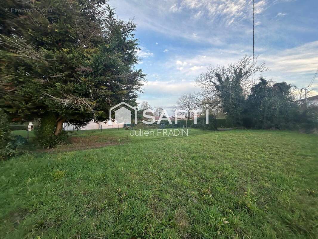 Photo 2 - Maison à SAINT-JULIEN-DE-CONCELLES