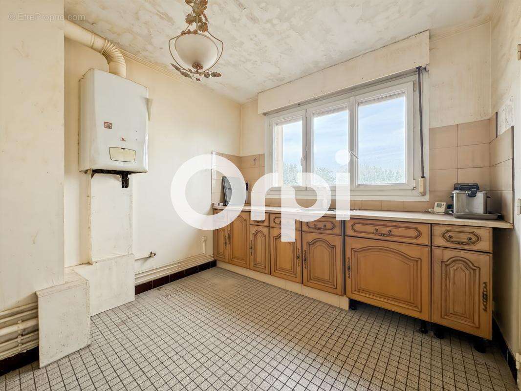 Appartement 2 chambres, ascenseur, balcon et cave à Saint-Pol-sur-Mer (59430) - photo 2