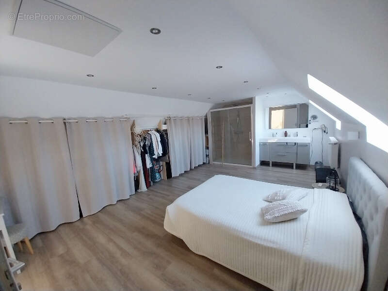 Maison à PARIGNE-L'EVEQUE