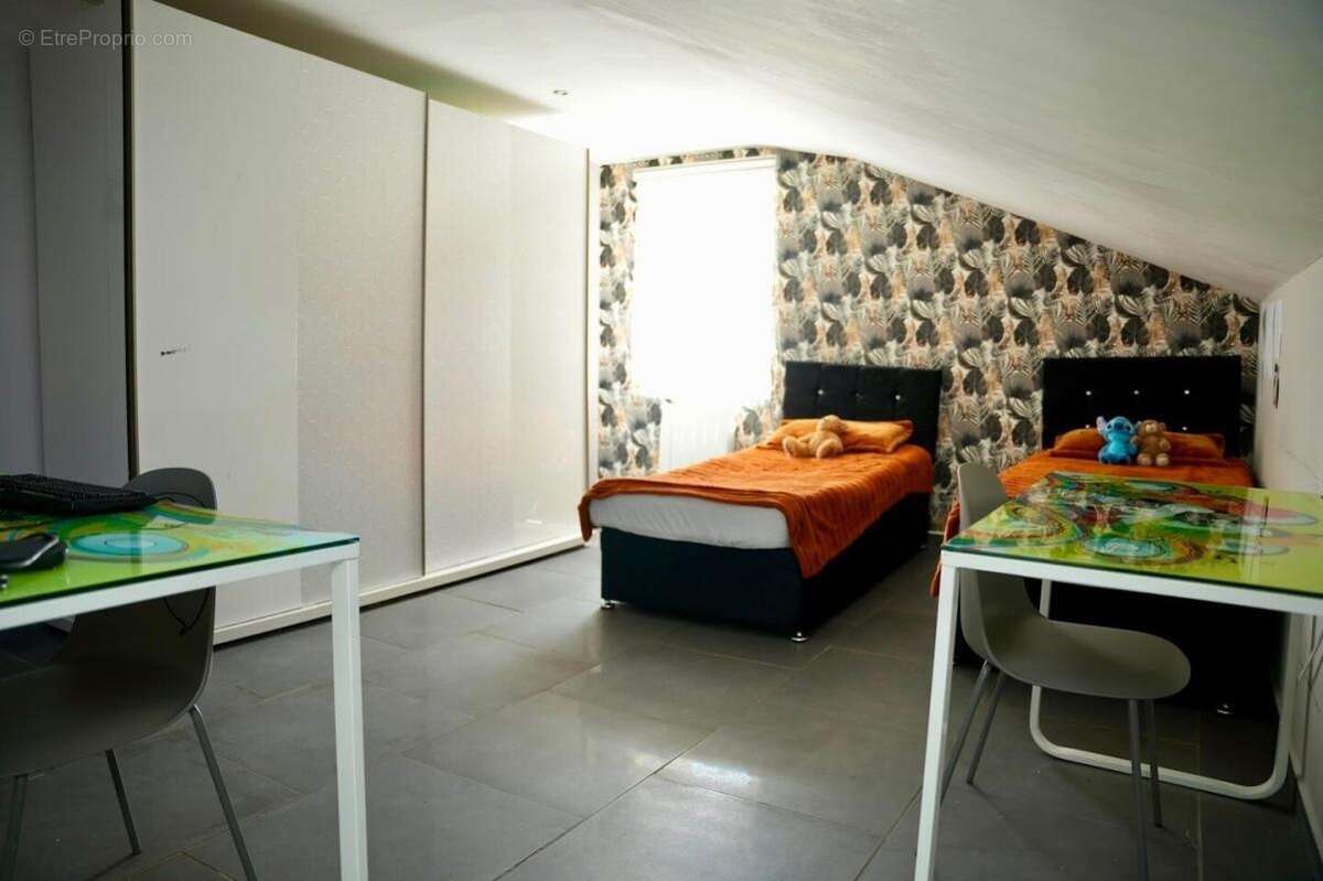 Maison de 103 m2 + salon de coiffure de 33 m2 à Mulhouse - photo 12