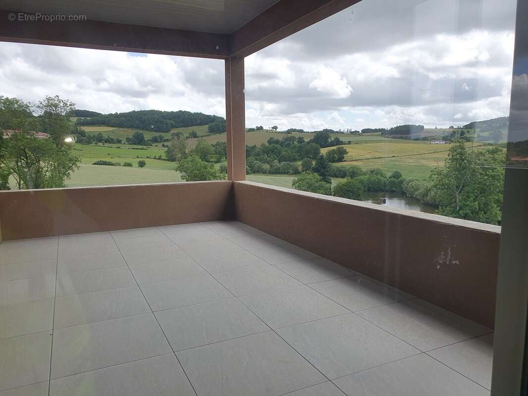Vue panoramique depuis la loggia -  - Appartement à LONGESSAIGNE