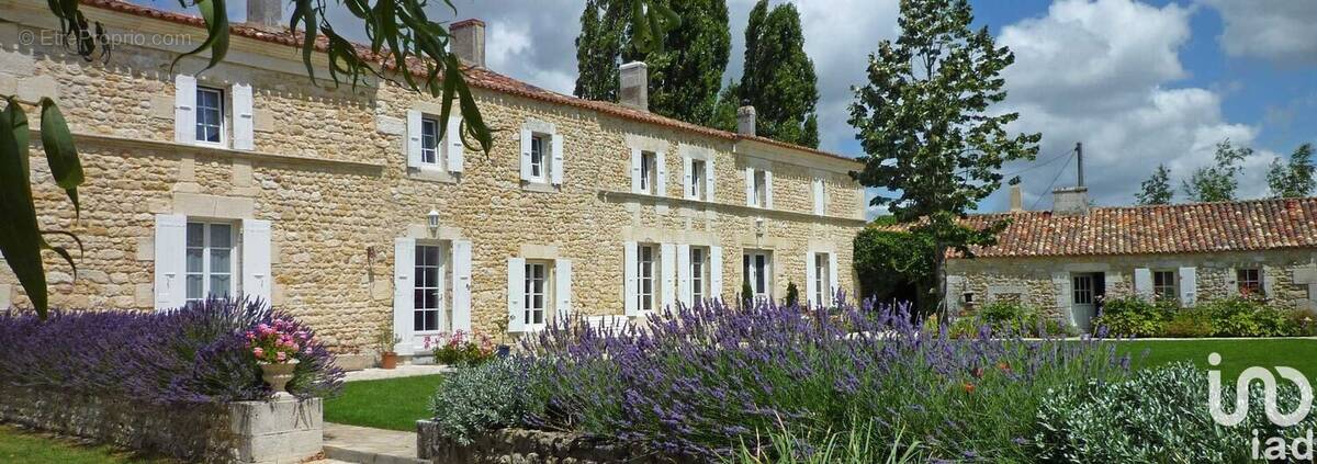 Photo 1 - Maison à LA GRIPPERIE-SAINT-SYMPHORIEN