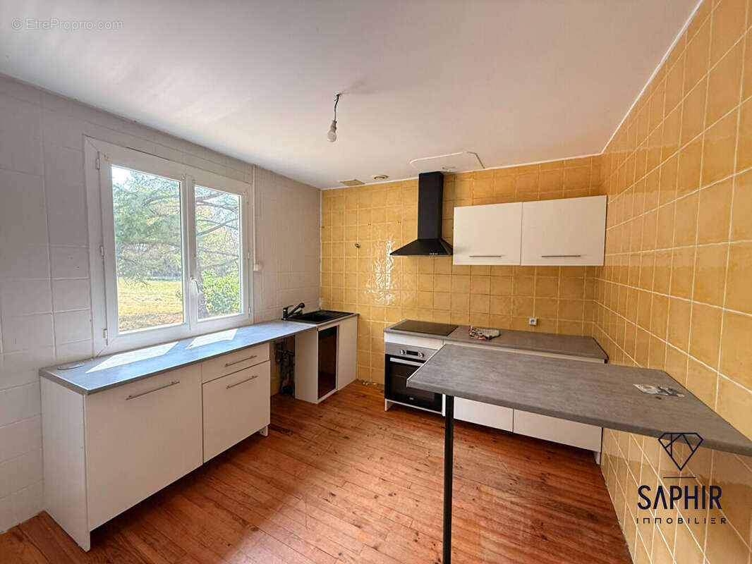 Maison 5 pièces à vendre à Daux - 186 m² sur terrain de 4890 m² - photo 3