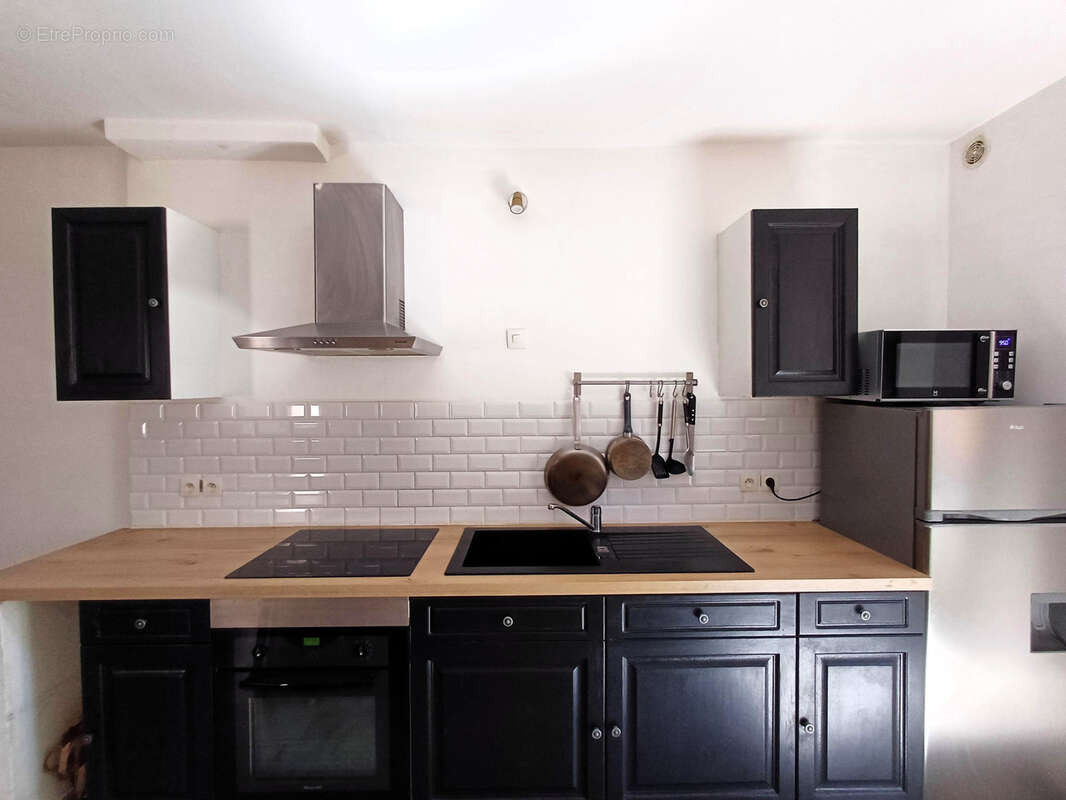 Maison de village 60 m2 Type 2 en duplex avec grande cave - photo 4