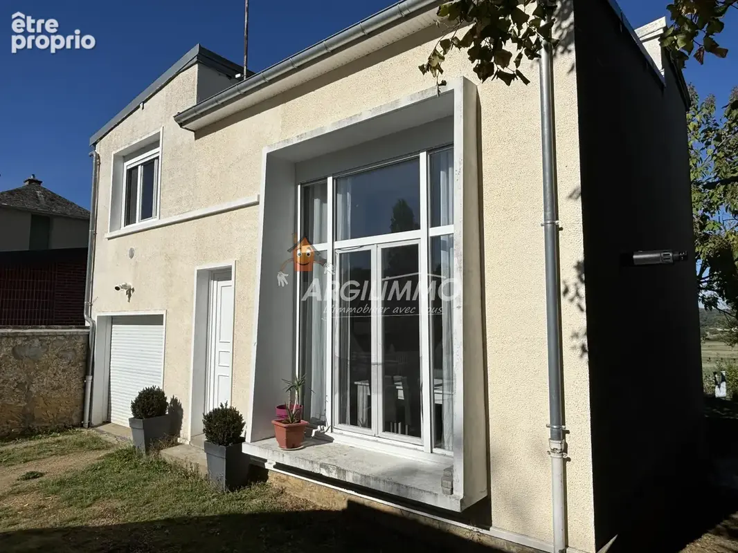 Maison au caractère architectural unique - 3 chambres - photo 1