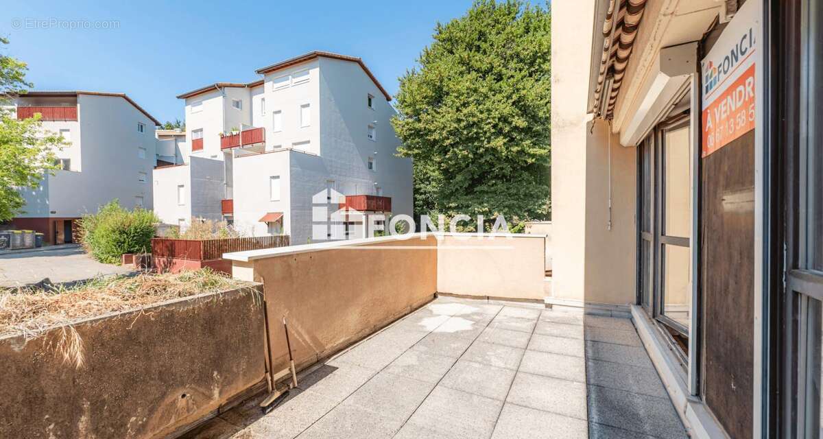 SECTEUR MALISSOL T4, avec grande terrasse, box fermé et place de parking intérieur - photo 2