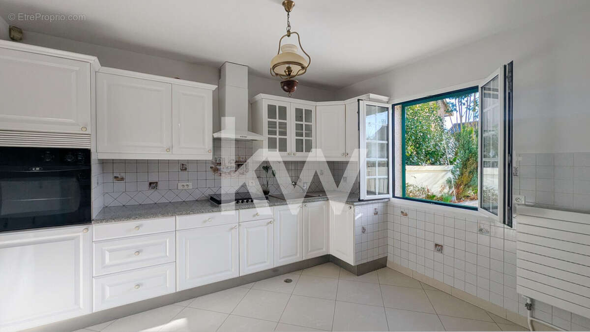 Maison 139 m² à Saint-Gratien  - photo 8