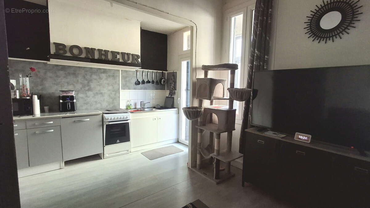 Appartement T3 avec cour privative - photo 4