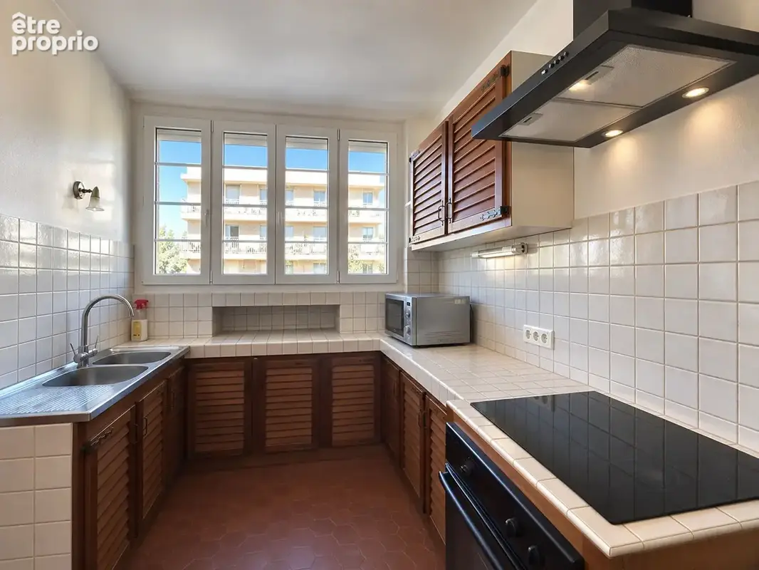 Appartement 4 pièce(s) 68 m² - secteur etion - photo 2