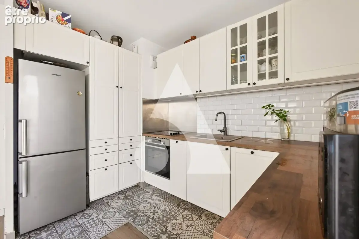 Appartement St Ouen 4 pièce(s) 88 m2 - photo 3