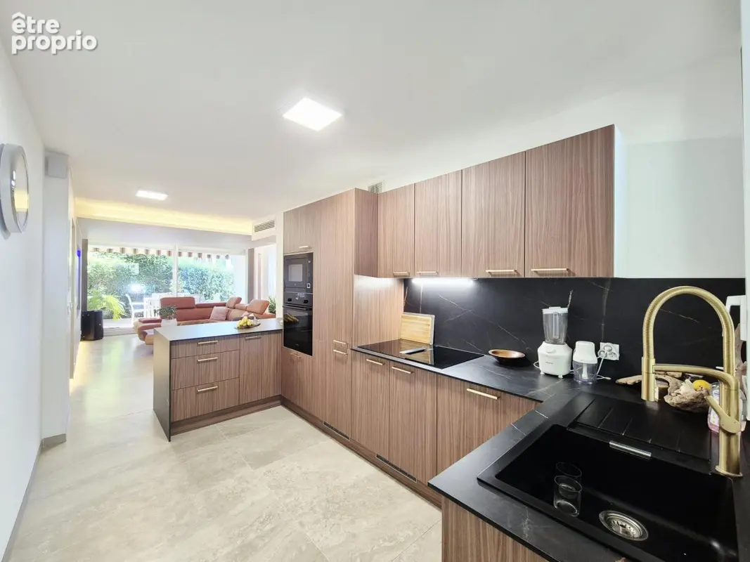 Grand T4 secteur ponant en rez-de-jardin. - photo 11
