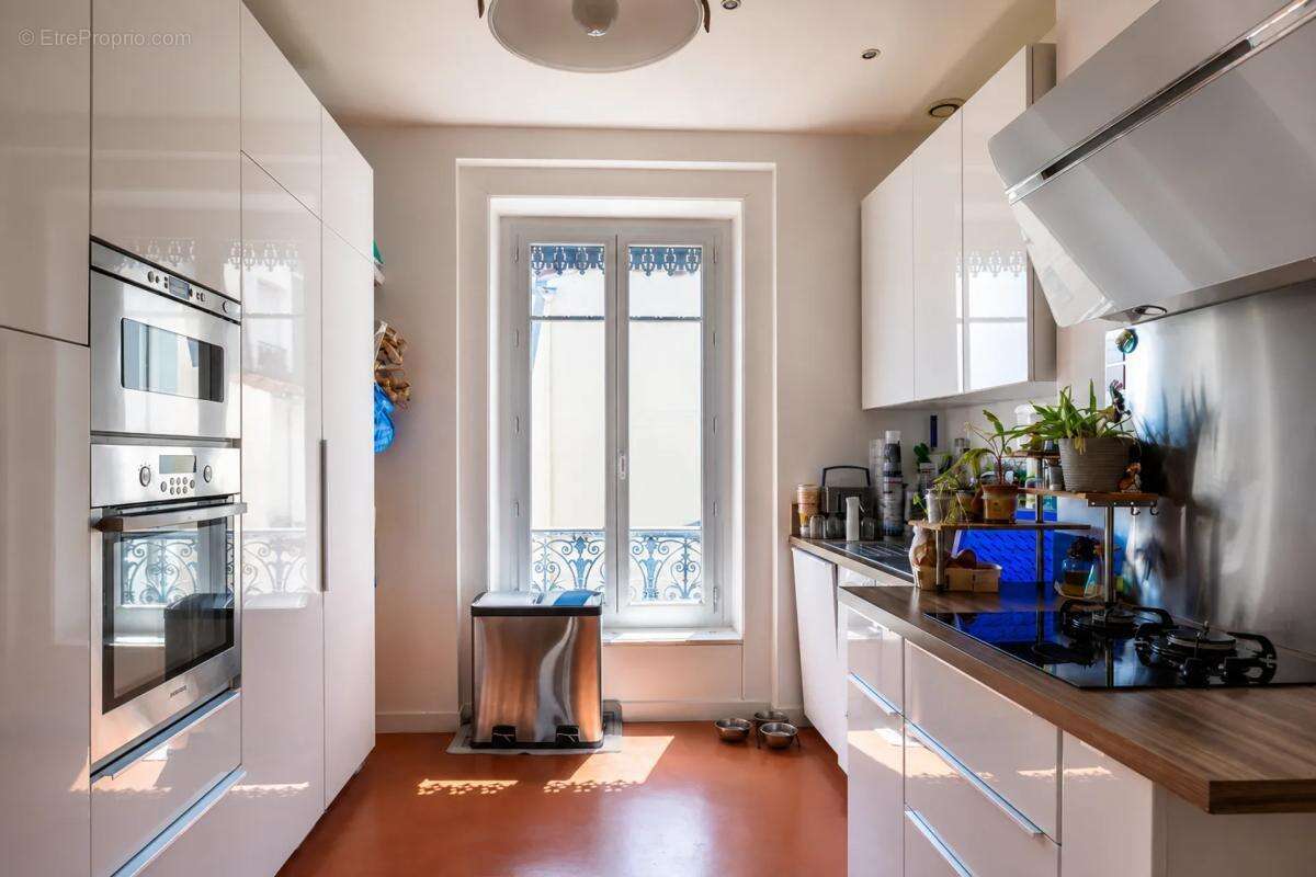 Lyon 7ᵉ – Duplex haussmannien d'exception sur les quais du Rhône – Vue panoramique sur Fourvière - photo 14