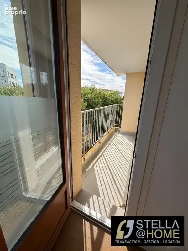 T2 traversant au sein d'une copropriété verdoyante - photo 3