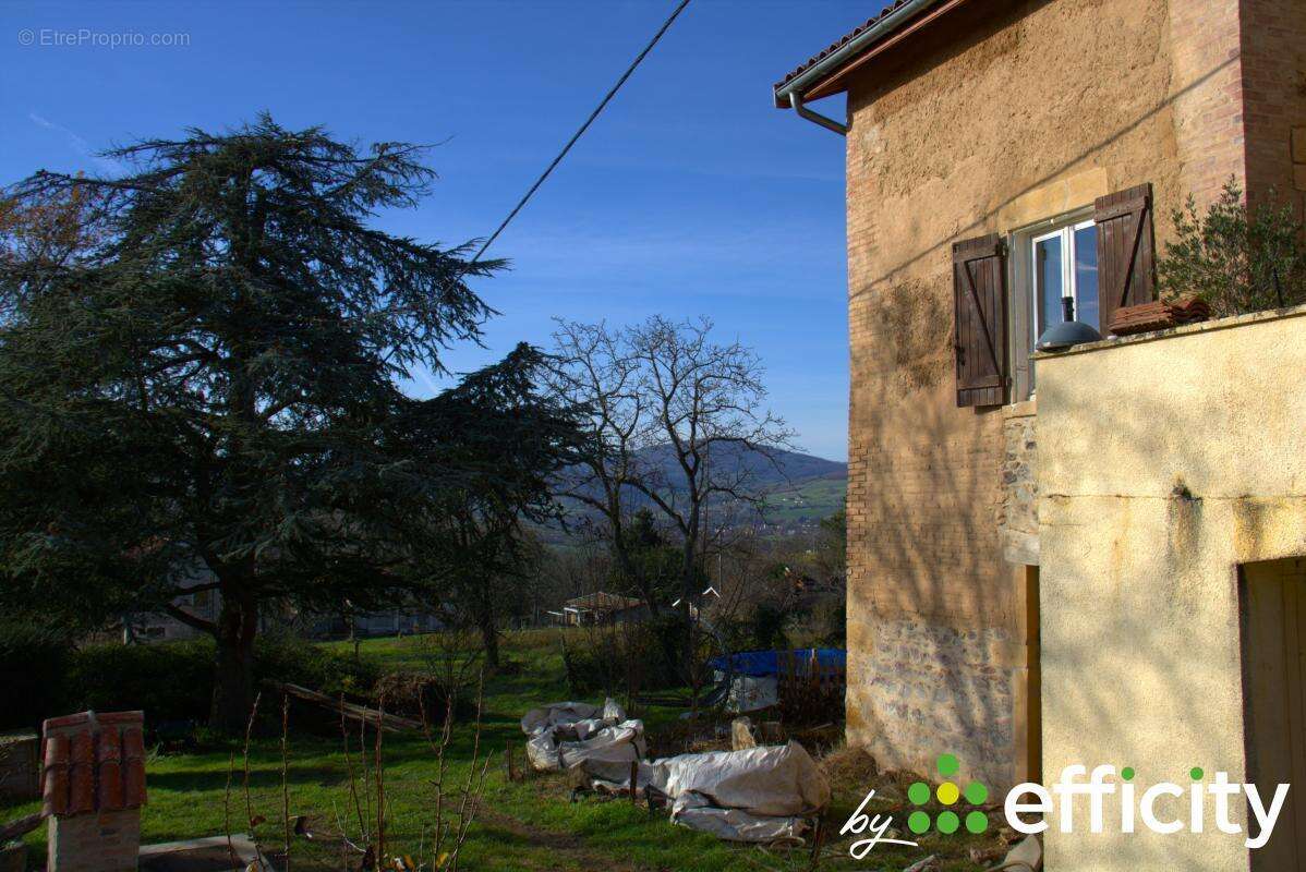 Maison à SOURCIEUX-LES-MINES