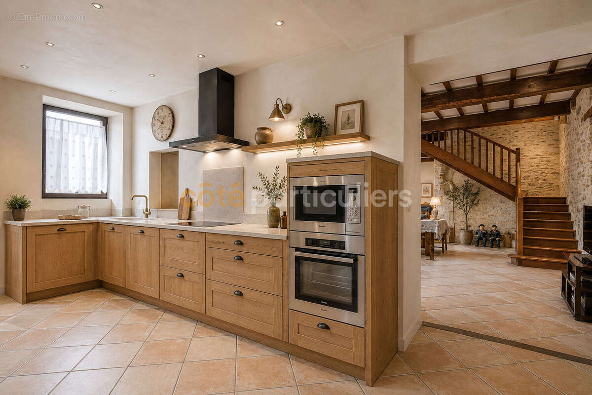 La roche sur yon -- longere en pierre -- 9 pieces -- 5 chambres -- 275 m² -- poutres apparentes -- pierre -- beaux volumes - photo 4