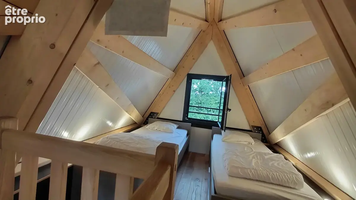 Maison en A de 49m2 à Loray sur une parcelle de près de 10 ares - photo 8