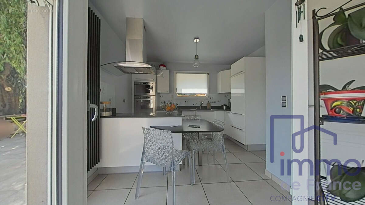 Maison 88 m² à Saint-Jean-Bonnefonds  - photo 5