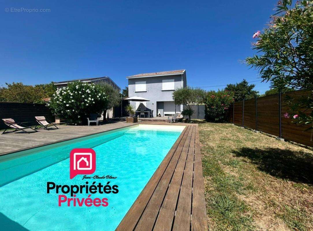 Ambès - Maison de 82 m2 habitables sur un terrain clos d'environ 596 m2- Piscine chauffée- Terrasse en bois exotique 100 m² -Poo - photo 1
