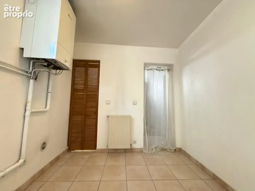Maison de ville 84,06 m2 avec garage - Firminy centre / place Marquise - photo 7