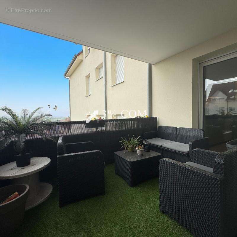 3%COM beau F3 avec terrasse et 2 places de parking- cave - photo 5