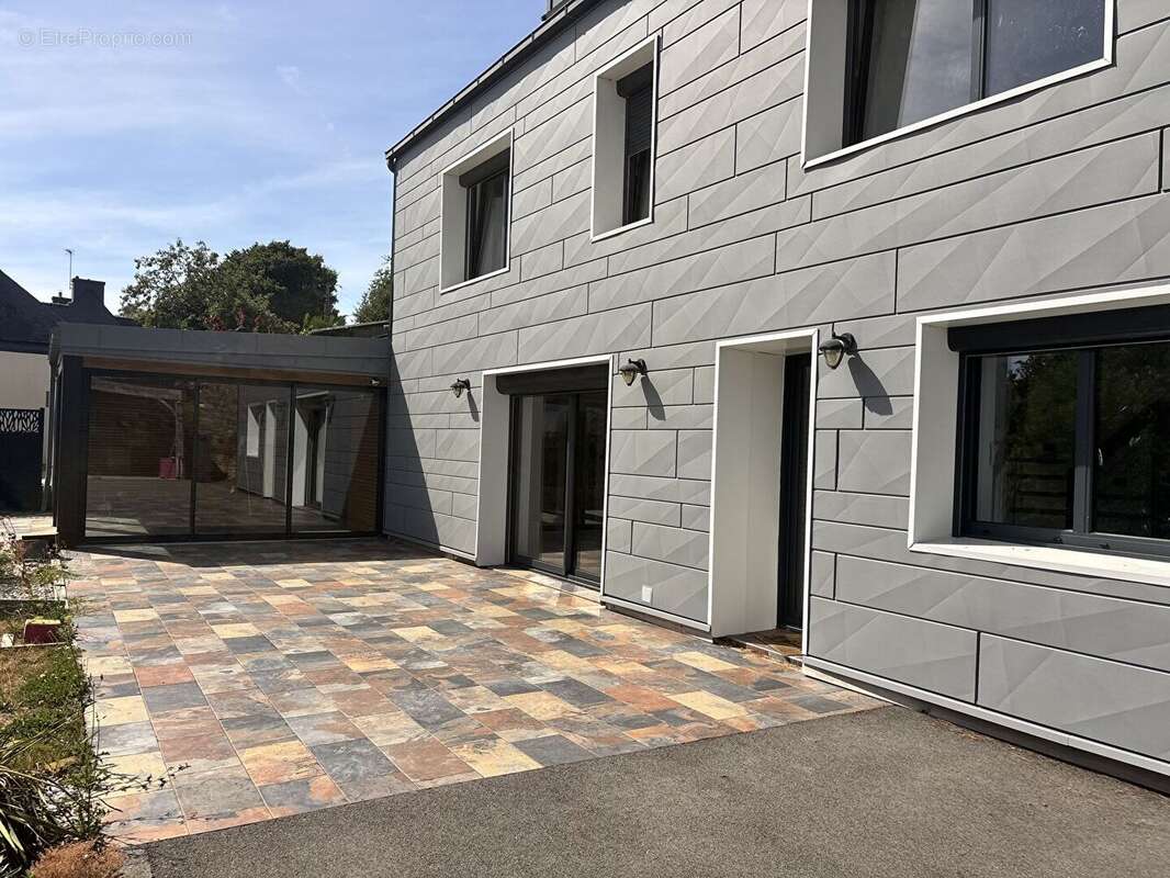 Maison récente 7 pièces à vendre à Caudan - 495 125 - photo 4