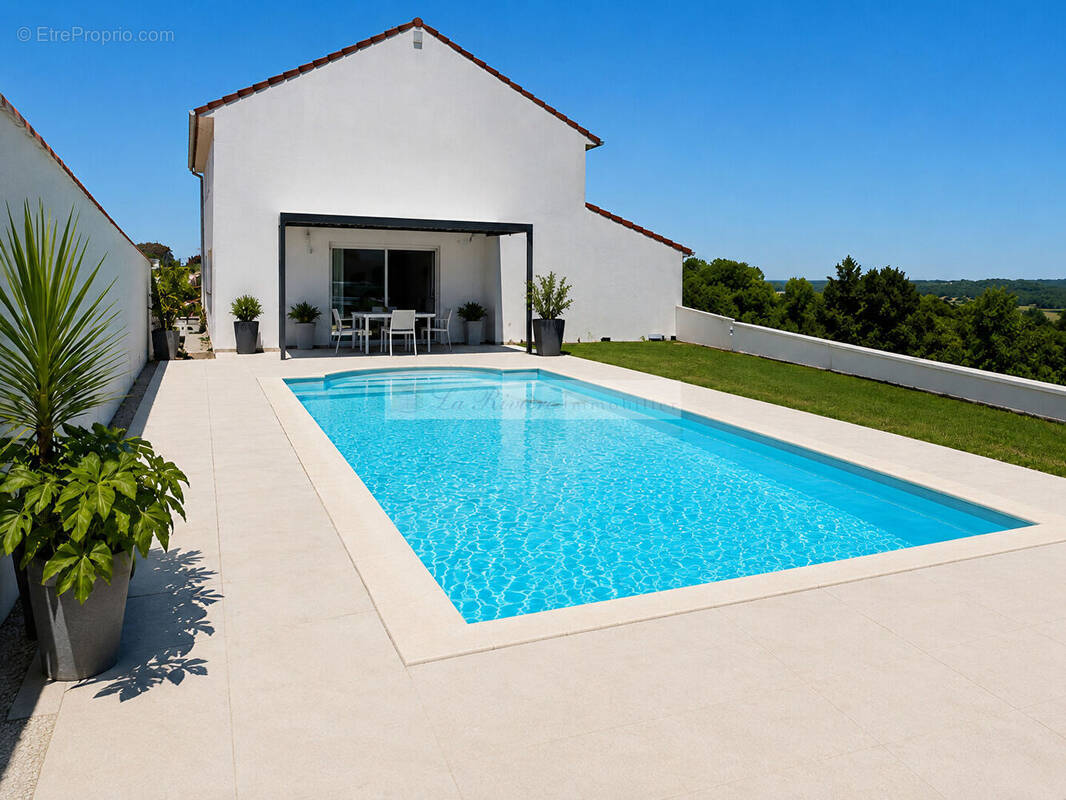 Maison à COGNAC