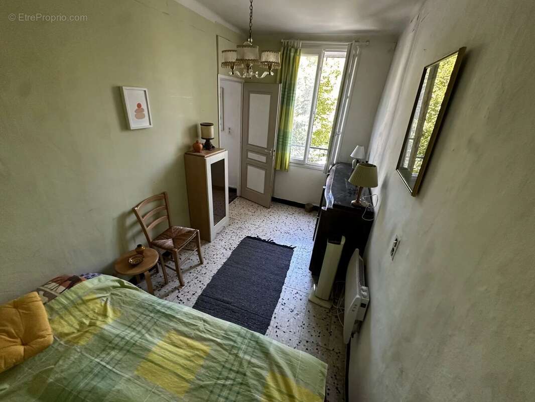 Appartement traversant, 2 chambres, 1 cave de 23 m2 - photo 6