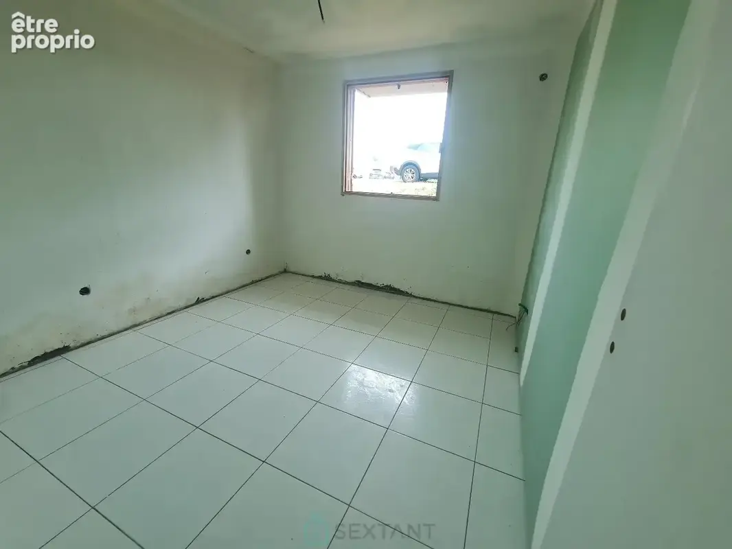 Maison inachevée de 92 m² à Le Moule sur un terrain de 900 m² - photo 6