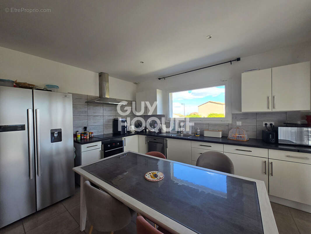 Maison à LAUDUN-L'ARDOISE