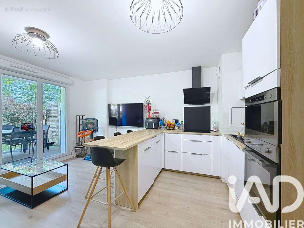 Photo 2 - Appartement à LE PLESSIS-TREVISE