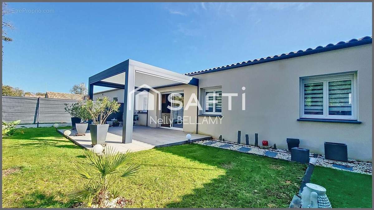 Photo 2 - Maison à SAINT-JULIEN-DES-LANDES