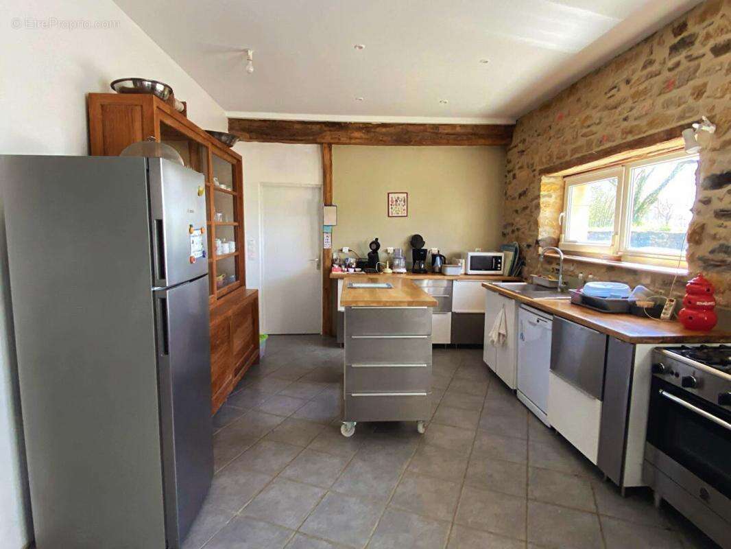 Maison en pierre avec piscine à Excideuil 5 pièce(s) 180 m2 - photo 5