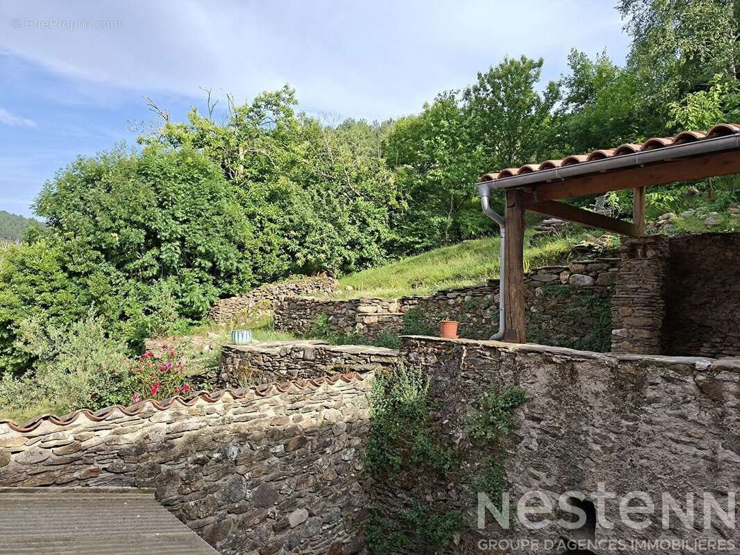Maison en pierre rénovée de 124 m2 avec 7 678 m² de terrain - Havre de paix en Cévennes - photo 18