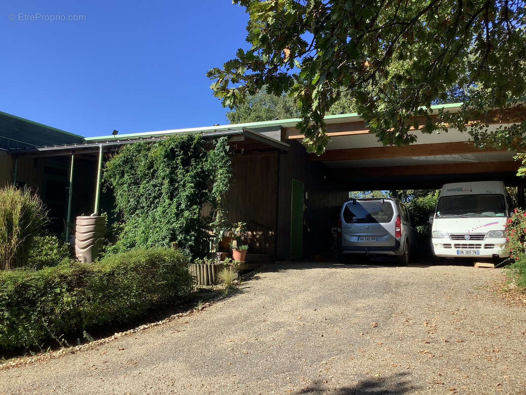Maison bioclimatique à ossature bois avec gîte, piscine naturelle et autonomie énergétique - photo 12