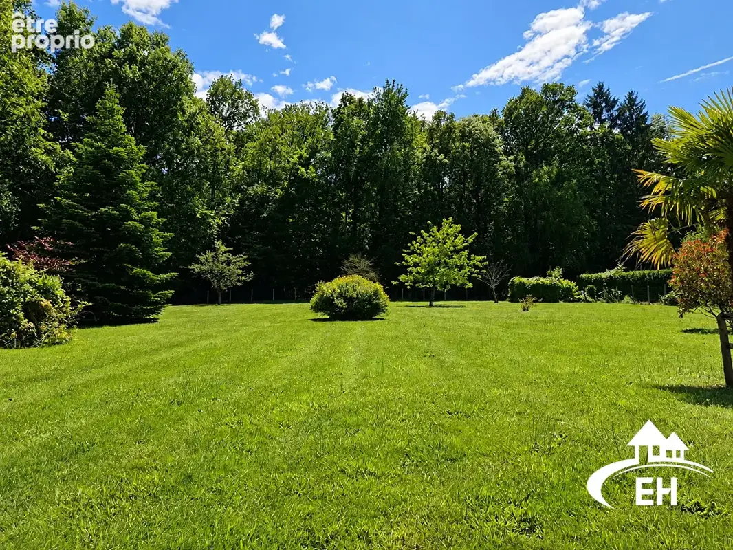 Maison de plain-pied avec grand terrain arboré de 3 407 m² - photo 8