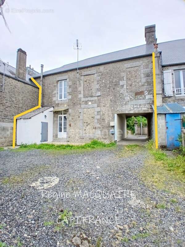 Maison à vendre 4 pièces SOURDEVAL (50) : 3 chambres, garage et extérieur privatif - photo 15