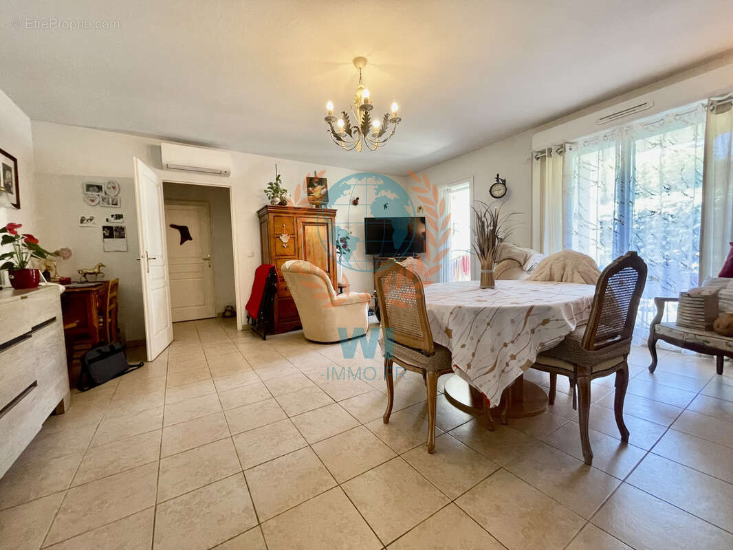 Appartement  en rez-de-jardin avec piscine et garage - photo 12