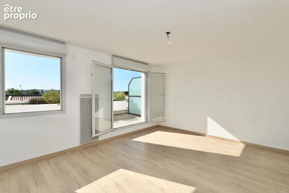 Appartement 3 pièces de 62,57 m² avec terrasse sans vis-à-vis, vue dégagée et parking en sous-sol - photo 2
