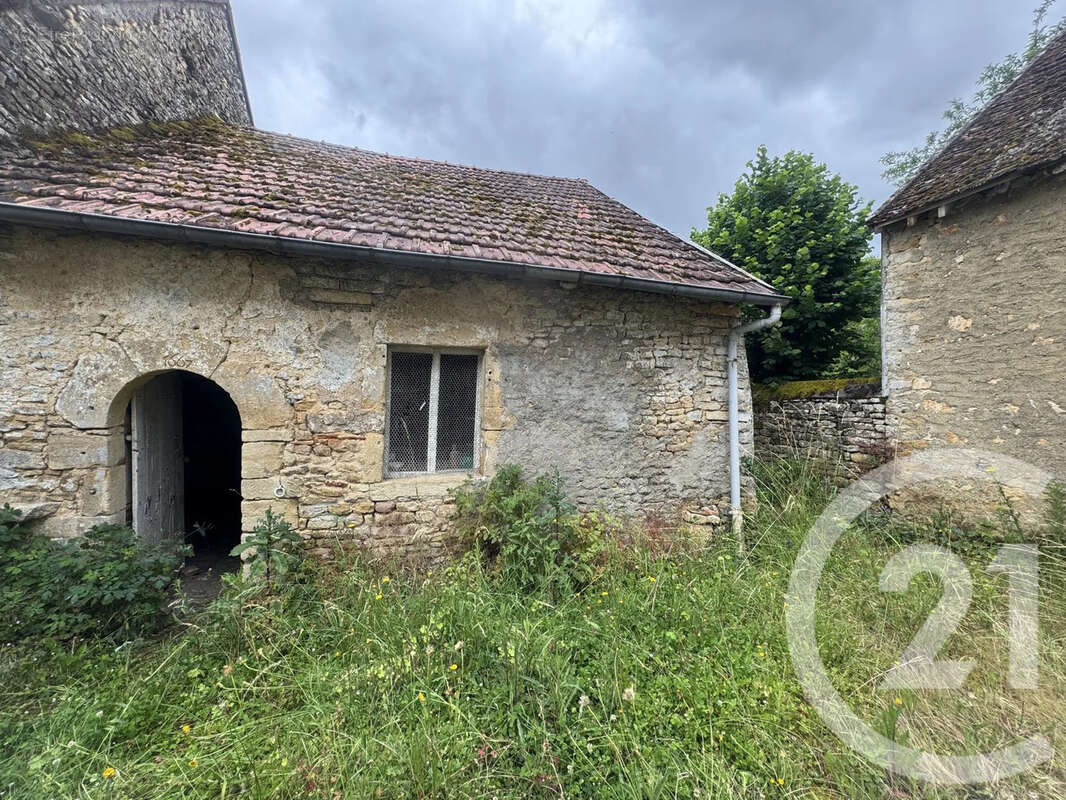Maison à MENOU