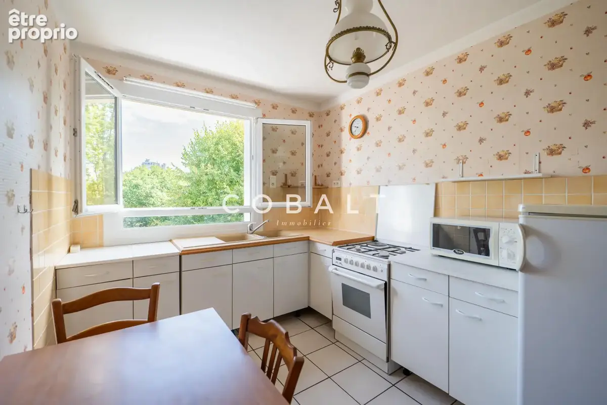 NANTES CANCLAUX   EXCLUSIVITÉ   Appartement T3 de 82 m2 en étage élevé avec balcon, grande cave de 9 m2 et par - photo 4