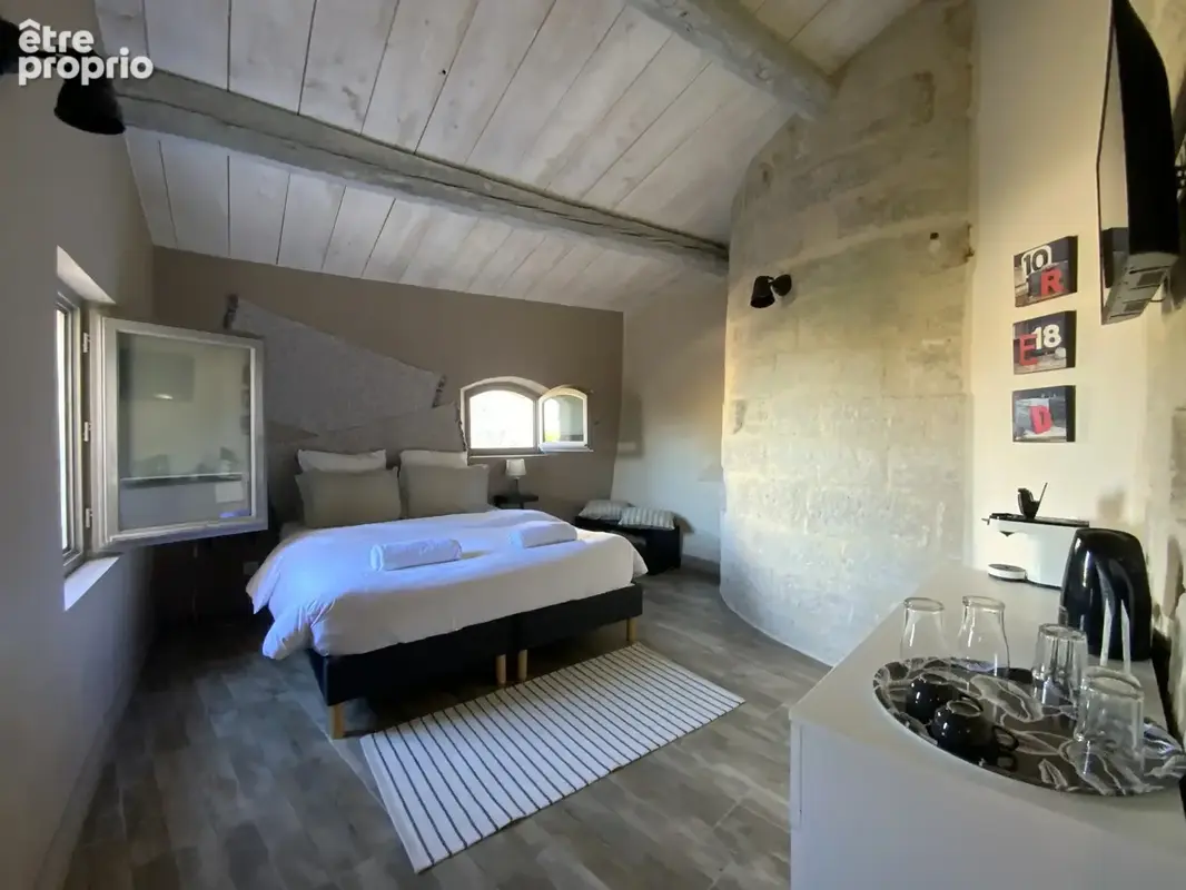 Maison en pierre rénovée avec terrasses en plein coeur historique d'Uzès. - photo 4