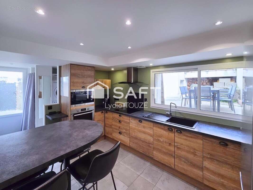 Photo 2 - Maison à EQUEURDREVILLE-HAINNEVILLE