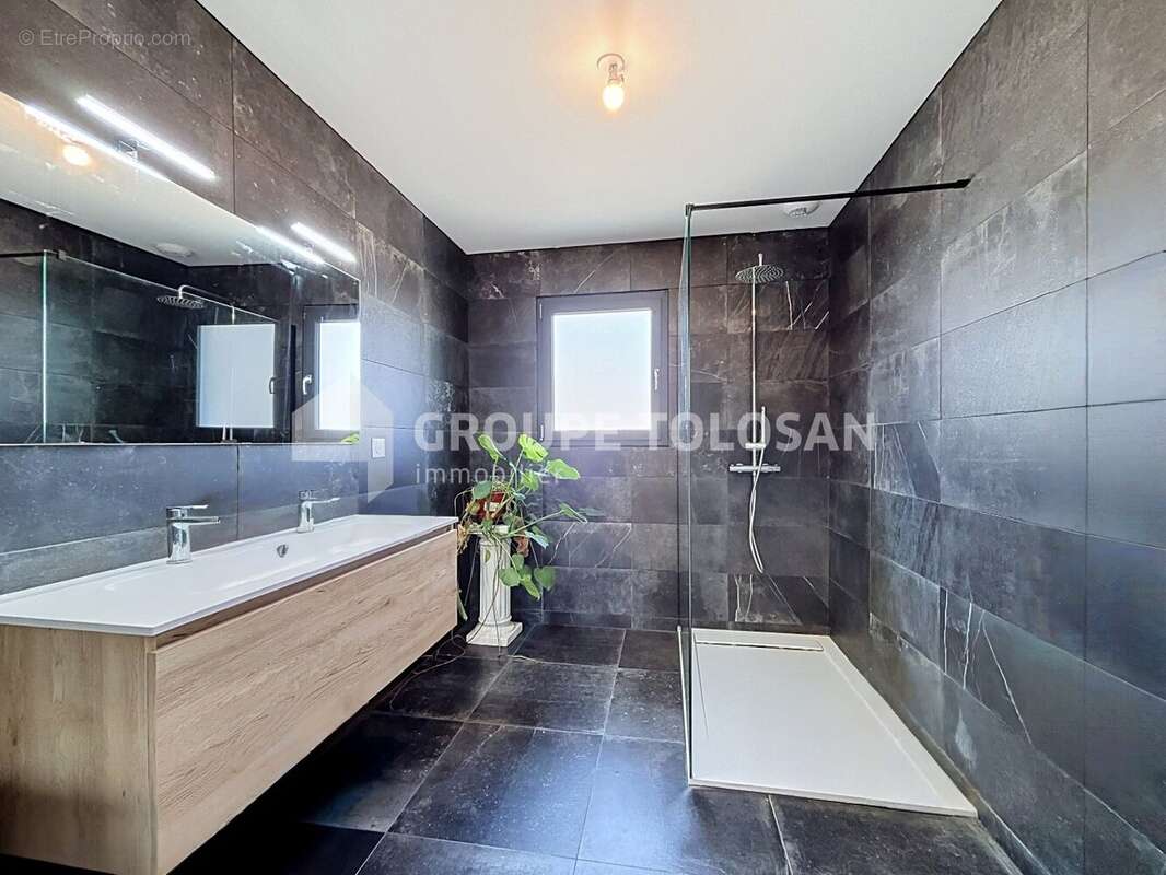 Maison 96 m² à Briatexte  - photo 11