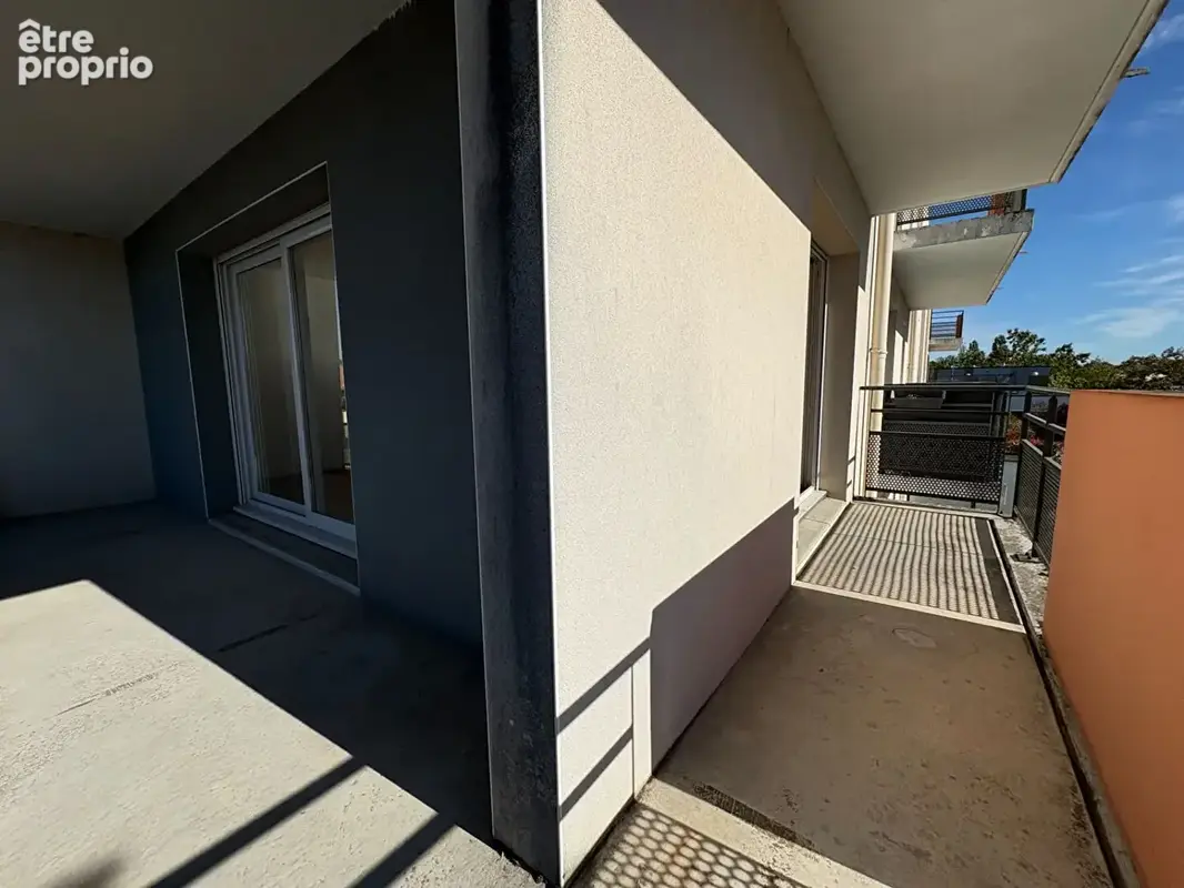 Appartement T4 de 83 m² avec balcon, garage double et cave - photo 3