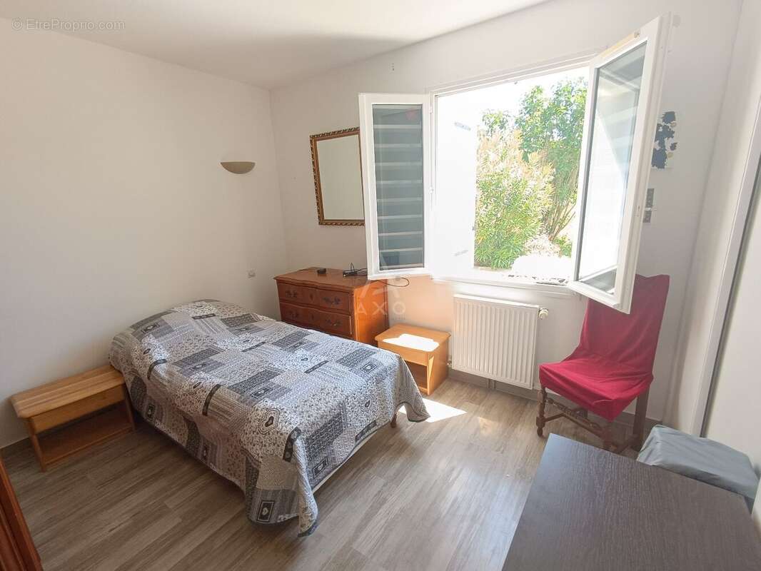 Maison de plain-pied avec jardin arboré  Magnac-sur-Touvre - photo 8